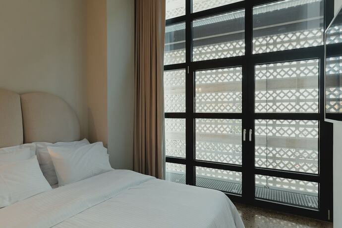 Imagen de la habitación del Hotel PlexiSpace. Foto 18