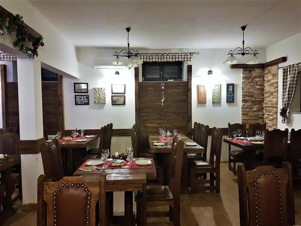 Imagen del bar/restaurante del Hotel Plitvica Luxury Etno Garden. Foto 3