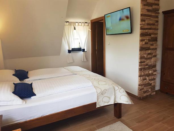 Imagen de la habitación del Hotel Plitvica Luxury Etno Garden. Foto 8