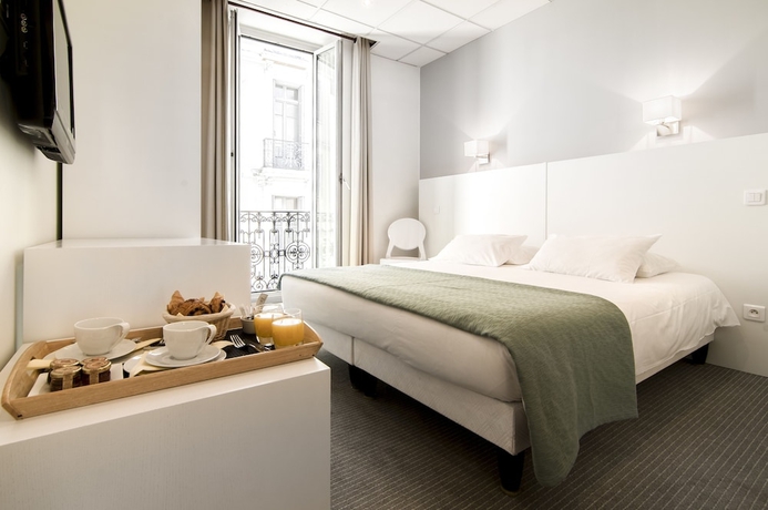 Imagen de la habitación del Hotel Plm. Foto 2