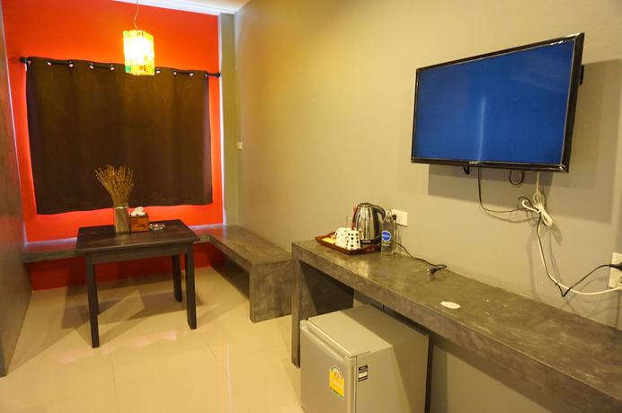 Imagen de la habitación del Hotel Ploenjai Ranong. Foto 10
