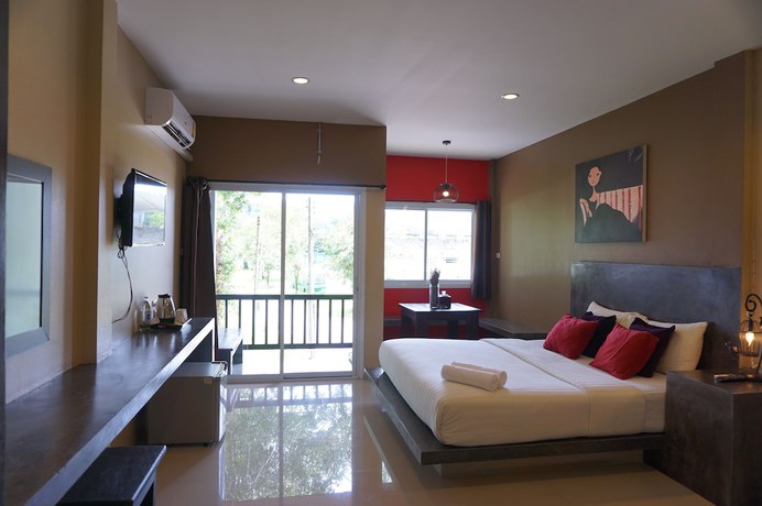Imagen de la habitación del Hotel Ploenjai Ranong. Foto 11