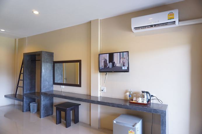 Imagen de la habitación del Hotel Ploenjai Ranong. Foto 15
