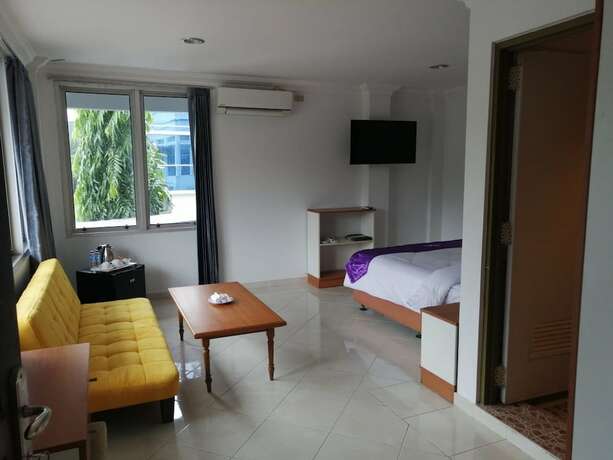 Imagen de la habitación del Hotel Plum Lading Banda Aceh. Foto 16