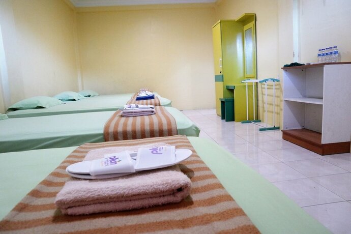 Imagen de la habitación del Hotel Plum Lading Banda Aceh. Foto 21