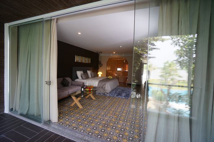 Imagen de la habitación del Hotel Plumeria Private Villa. Foto 6