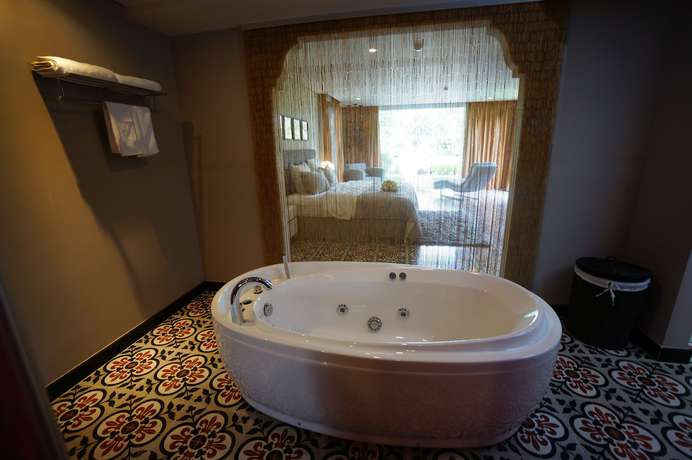Imagen de la habitación del Hotel Plumeria Private Villa. Foto 7