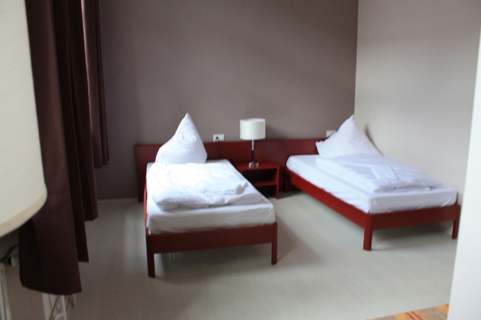 Imagen de la habitación del Hotel Plus Berlin Hotel. Foto 8