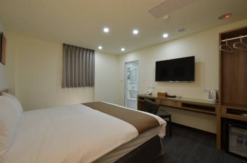 Imagen de la habitación del Hotel Plus Hotel. Foto 1