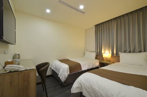 Imagen de la habitación del Hotel Plus Hotel. Foto 2