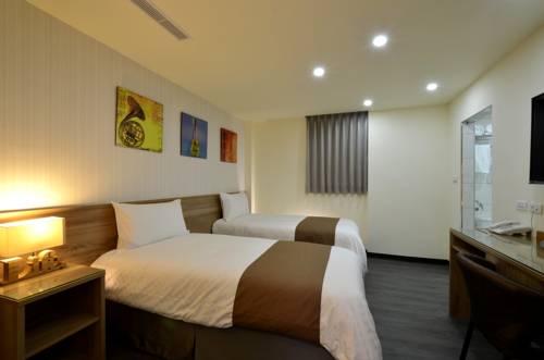 Imagen de la habitación del Hotel Plus Hotel. Foto 3