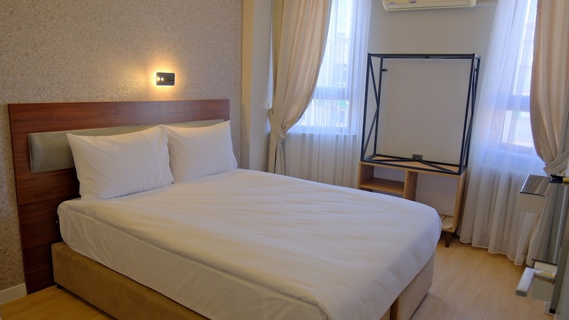 Imagen de la habitación del Hotel Pluscity. Foto 5