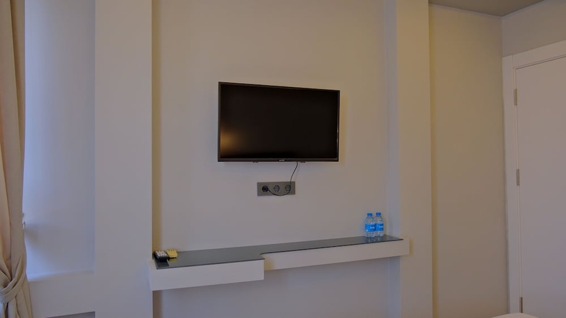 Imagen de la habitación del Hotel Pluscity. Foto 6