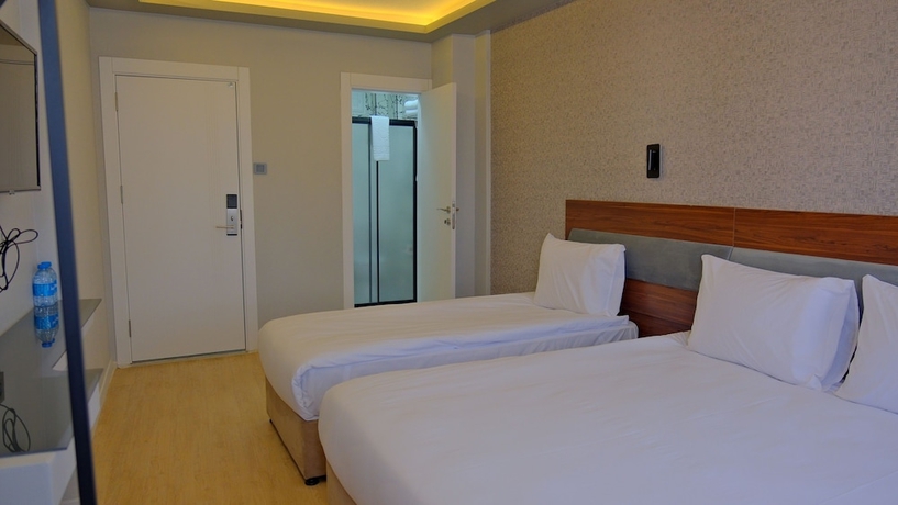 Imagen de la habitación del Hotel Pluscity. Foto 7