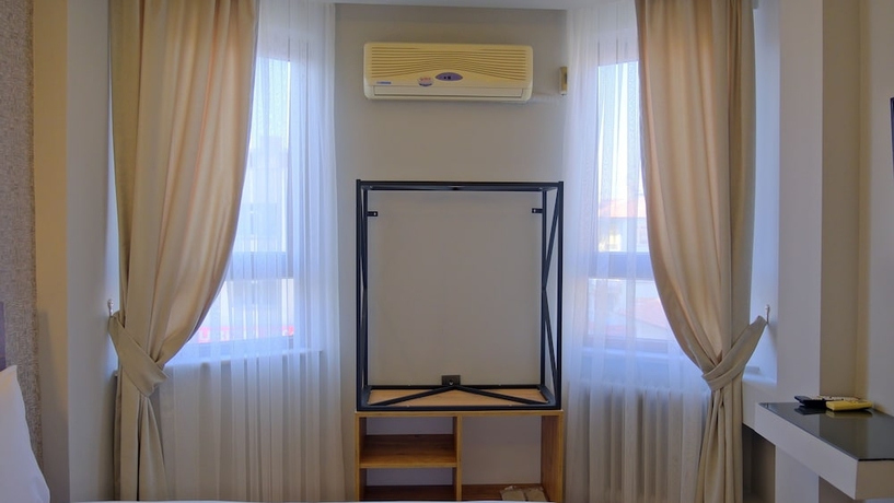 Imagen de la habitación del Hotel Pluscity. Foto 8