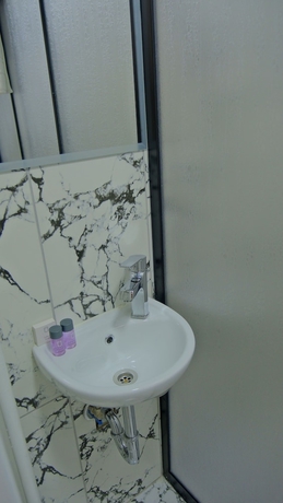 Imagen de la habitación del Hotel Pluscity. Foto 11
