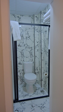 Imagen de la habitación del Hotel Pluscity. Foto 12