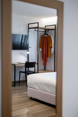 Imagen de la habitación del Hotel Pnoe Urban Living. Foto 14