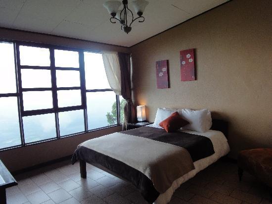 Imagen de la habitación del Hotel Poas Lodge. Foto 7