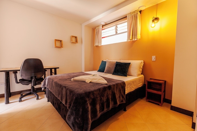Imagen de la habitación del Hotel Poblado Guest House. Foto 4