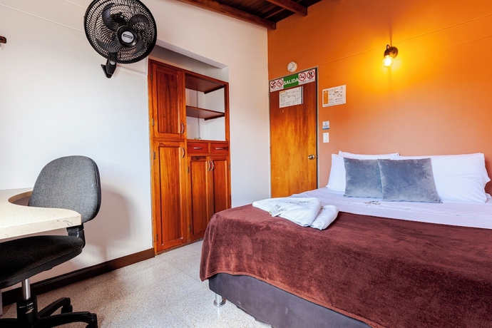 Imagen de la habitación del Hotel Poblado Guest House. Foto 6
