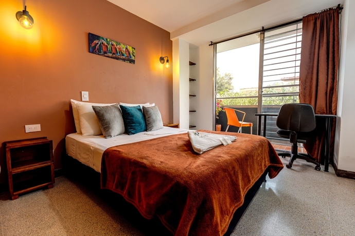 Imagen de la habitación del Hotel Poblado Guest House. Foto 8