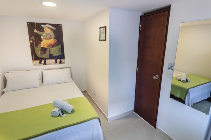 Imagen de la habitación del Hotel Poblado Guest House. Foto 11