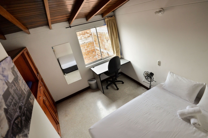 Imagen de la habitación del Hotel Poblado Guest House. Foto 12