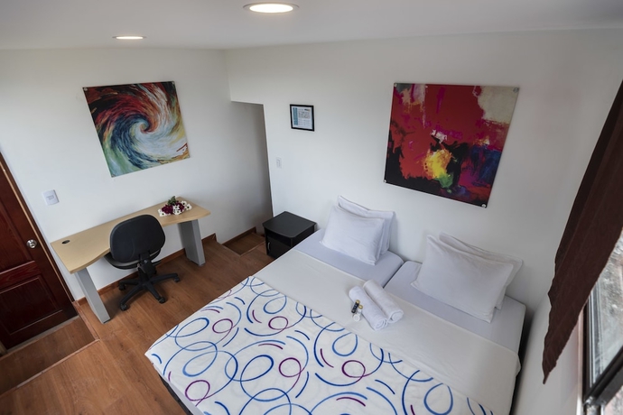 Imagen de la habitación del Hotel Poblado Guest House. Foto 14