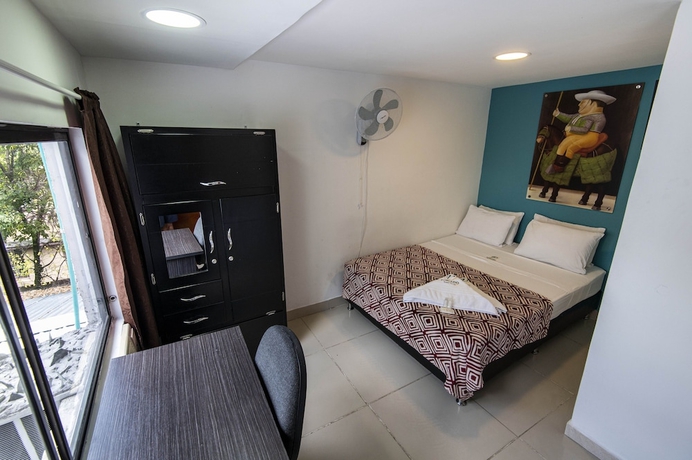 Imagen de la habitación del Hotel Poblado Guest House. Foto 17