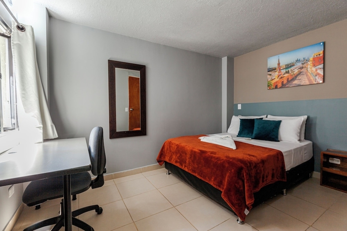 Imagen de la habitación del Hotel Poblado Guest House. Foto 19