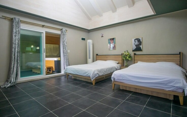 Imagen de la habitación del Hotel Pocheon Joey Tomato Pension. Foto 19