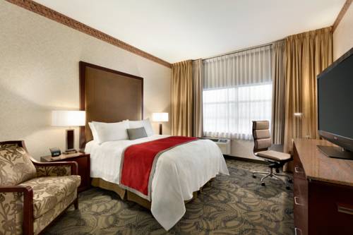 Imagen de la habitación del Hotel Poco Inn and Suites and Conference Centre. Foto 3