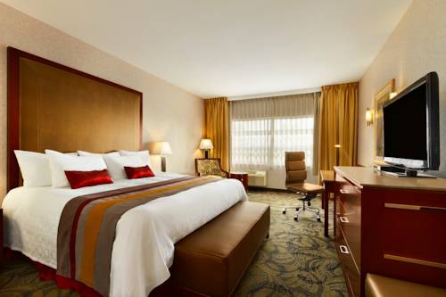 Imagen de la habitación del Hotel Poco Inn and Suites and Conference Centre. Foto 5