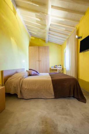 Imagen de la habitación del Hotel Podere Castellare Eco Resort in Tuscany. Foto 2