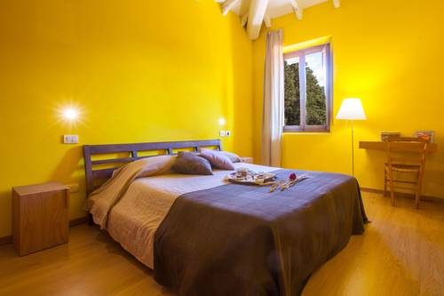 Imagen de la habitación del Hotel Podere Castellare Eco Resort in Tuscany. Foto 5
