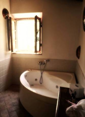 Imagen de la habitación del Hotel Podere Palazzolo. Foto 7