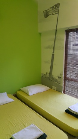 Imagen del bar/restaurante del Hotel Pods The Backpackers Home And Cafe. Foto 6