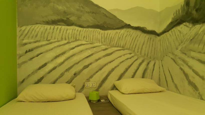 Imagen del bar/restaurante del Hotel Pods The Backpackers Home And Cafe. Foto 7
