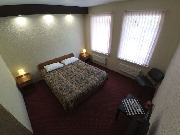 Imagen de la habitación del Hotel Podvor. Foto 22