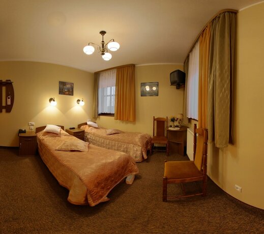 Imagen de la habitación del Hotel Podzamcze. Foto 17