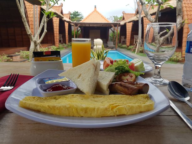 Imagen del bar/restaurante del Hotel Poedja Villa Jimbaran. Foto 9