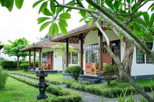 Imagen de la habitación del Hotel Poeri Devata Resort. Foto 7