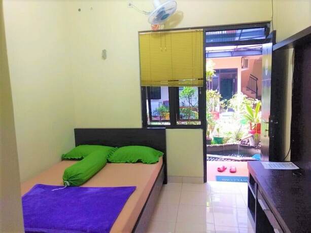 Imagen de la habitación del Hotel Poetri Guest House Syariah. Foto 20