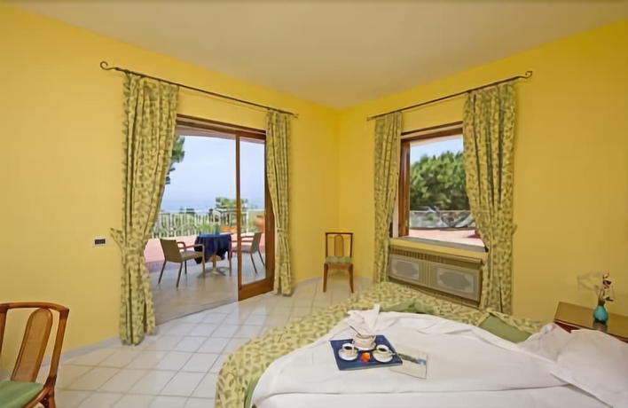 Imagen de la habitación del Hotel Poggio Aragosta and Spa. Foto 6