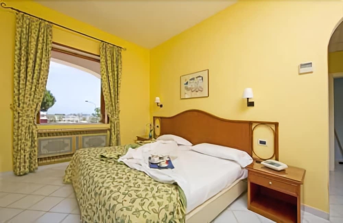Imagen de la habitación del Hotel Poggio Aragosta and Spa. Foto 7