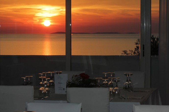Imagen del bar/restaurante del Hotel Poggio Degli Ulivi. Foto 6