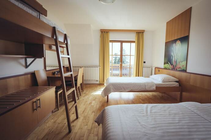 Imagen de la habitación del Hotel Pohorje Village Wellbeing Resort &ndash; Forest Videc. Foto 15