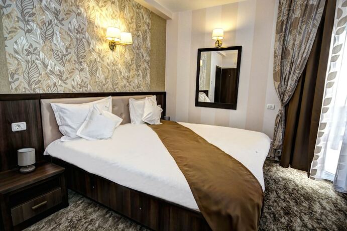 Imagen de la habitación del Hotel Poiana Viselor. Foto 17