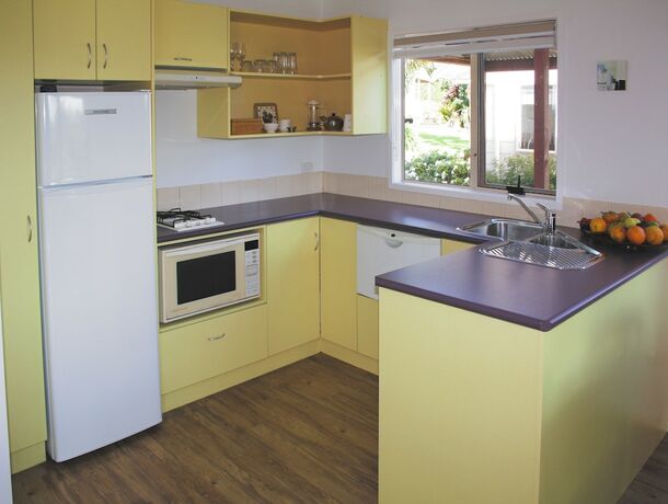 Imagen de la habitación del Hotel Poinciana Cottages. Foto 19